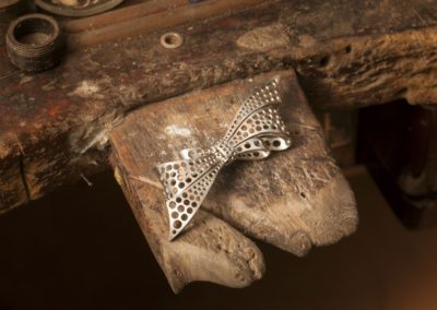 bow brooch